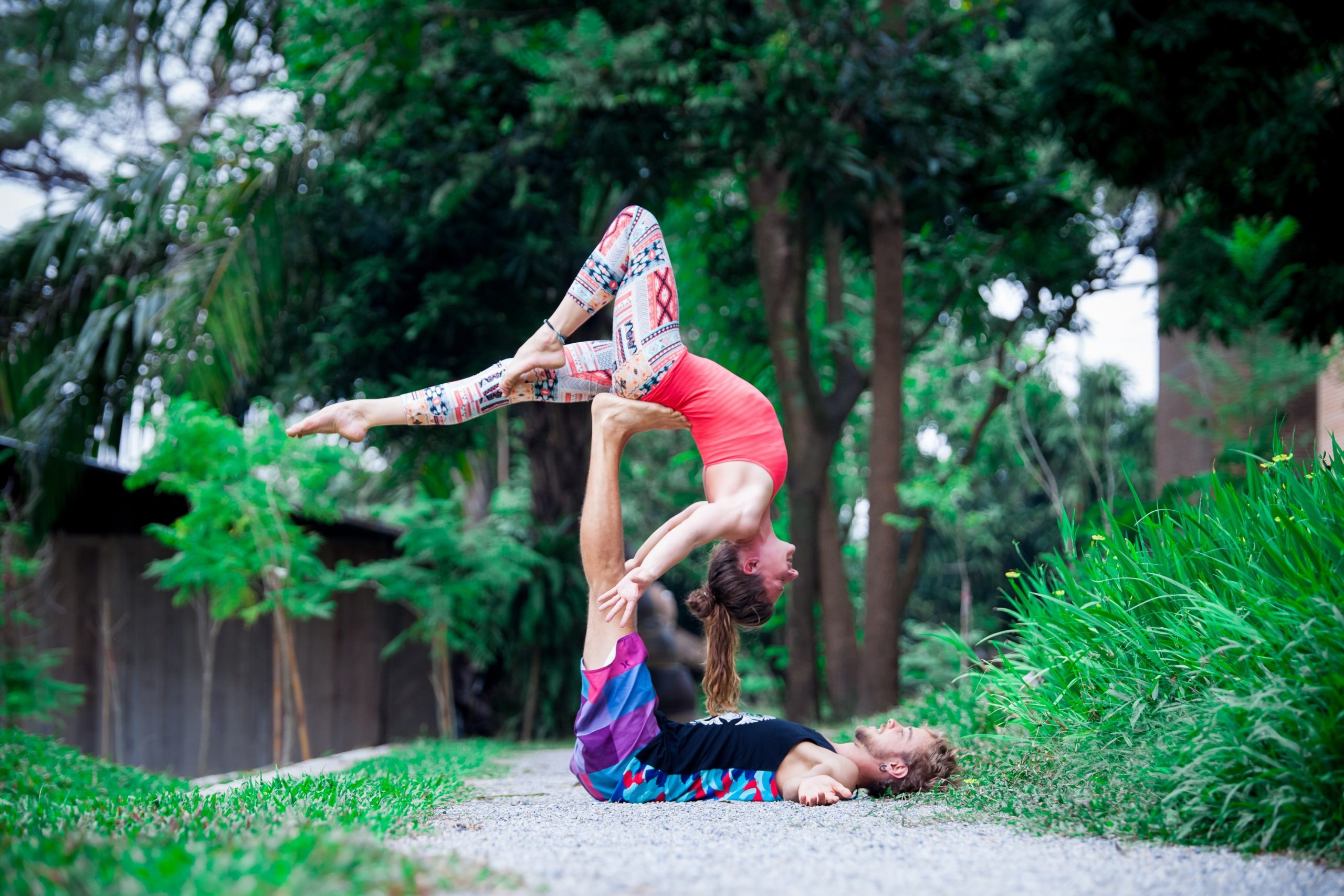 Emily and Gabe in an acro posture doing acroyoga